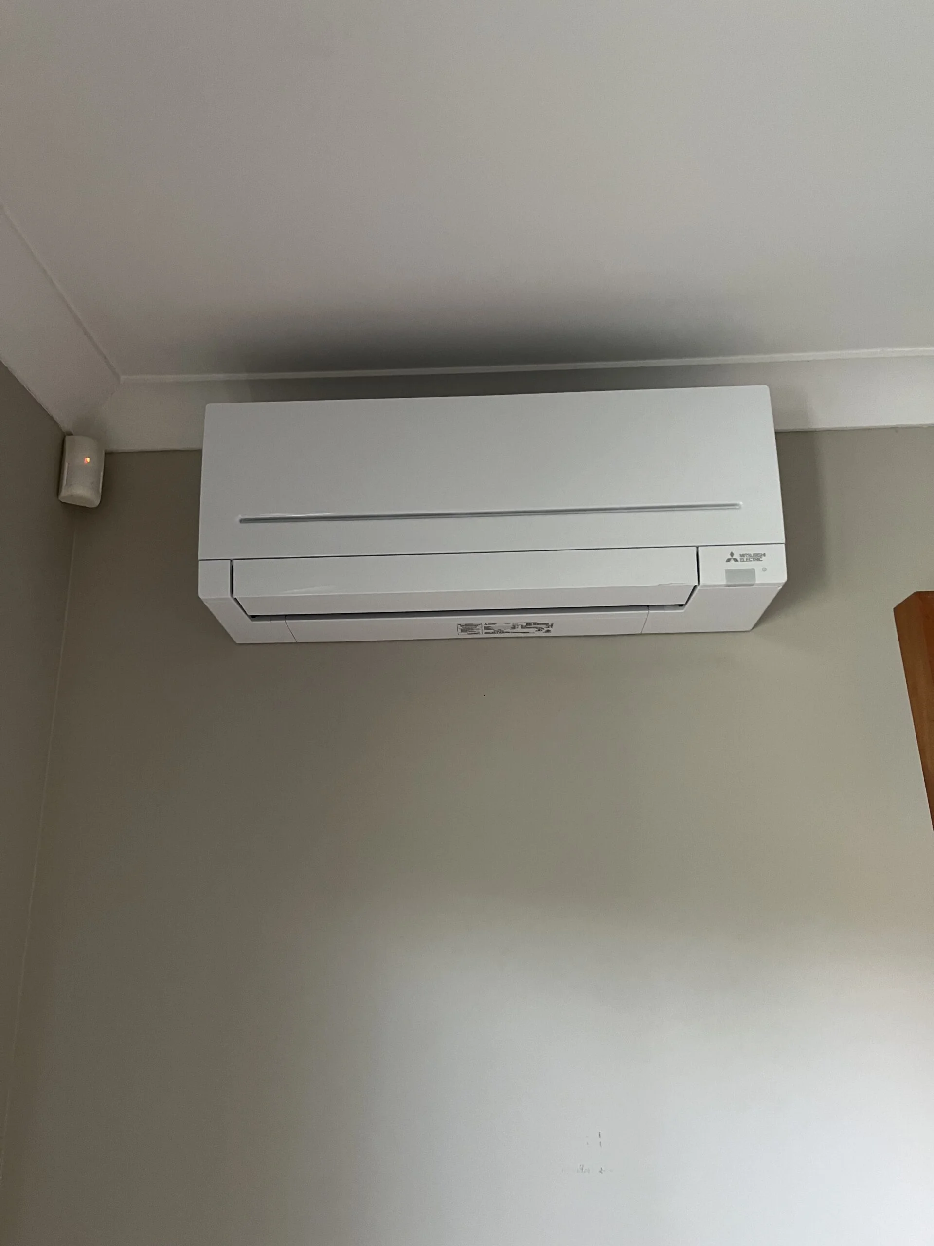 Mitsubishi Electric wall-mounted indoor split system air conditioner unit installed by MyTradie Services Sydney